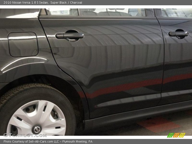 Super Black / Charcoal 2010 Nissan Versa 1.8 S Sedan