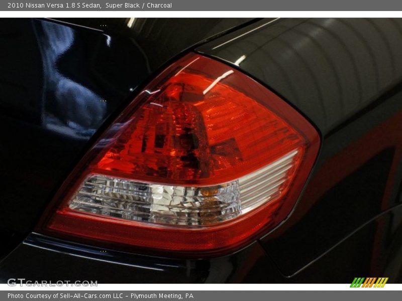 Super Black / Charcoal 2010 Nissan Versa 1.8 S Sedan