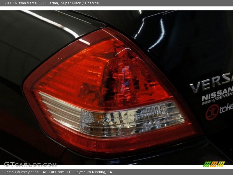 Super Black / Charcoal 2010 Nissan Versa 1.8 S Sedan