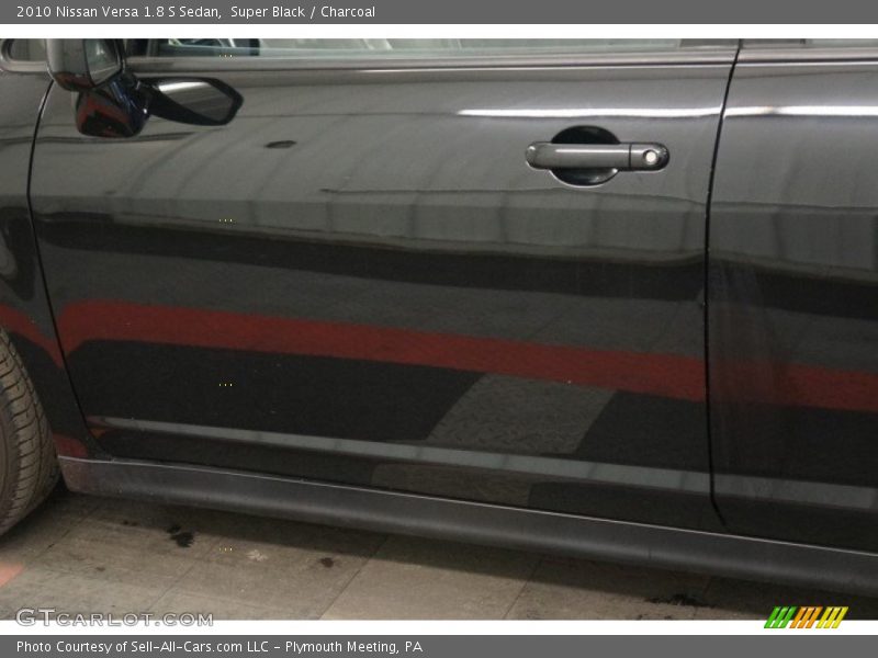 Super Black / Charcoal 2010 Nissan Versa 1.8 S Sedan