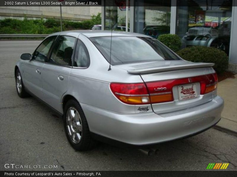 Bright Silver / Black 2002 Saturn L Series L300 Sedan