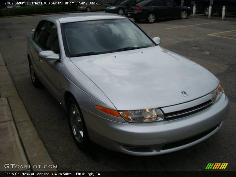 Bright Silver / Black 2002 Saturn L Series L300 Sedan