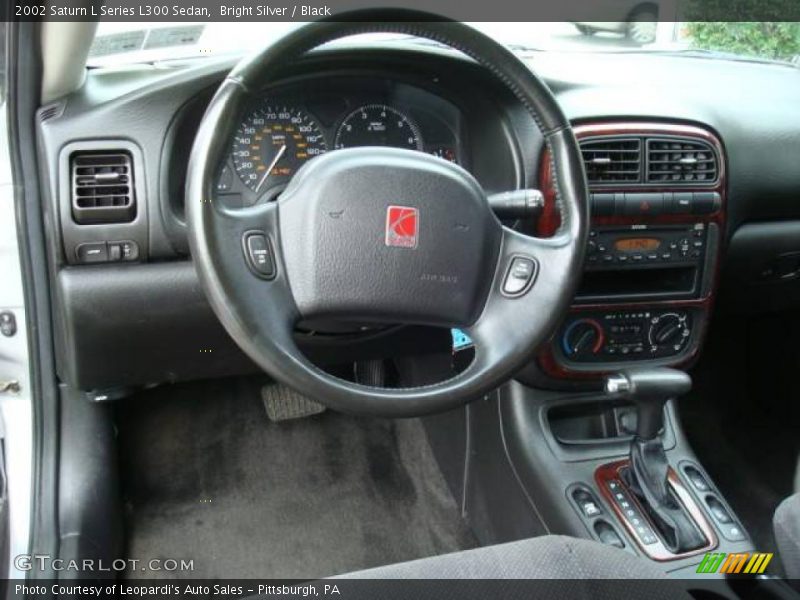 Bright Silver / Black 2002 Saturn L Series L300 Sedan