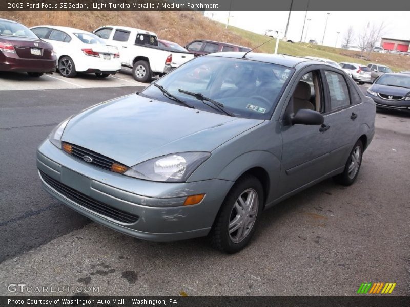 Light Tundra Metallic / Medium Parchment 2003 Ford Focus SE Sedan