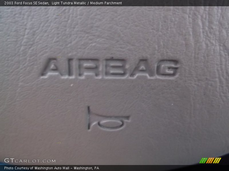 Light Tundra Metallic / Medium Parchment 2003 Ford Focus SE Sedan