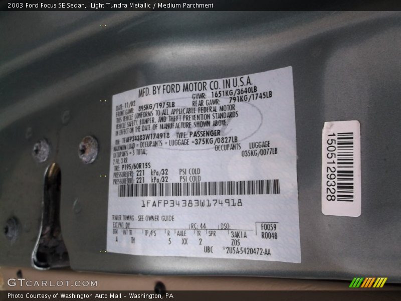 Light Tundra Metallic / Medium Parchment 2003 Ford Focus SE Sedan