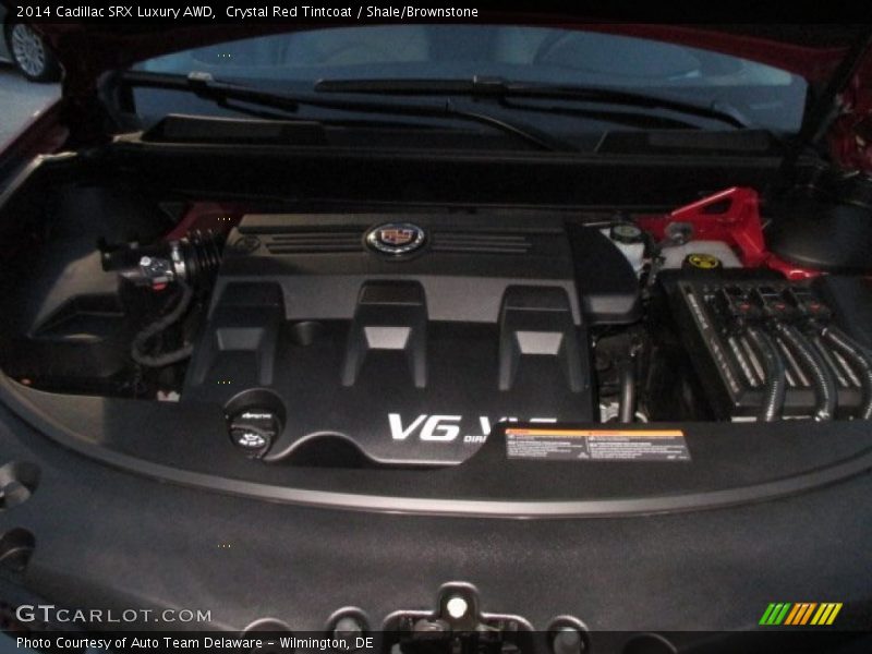 Crystal Red Tintcoat / Shale/Brownstone 2014 Cadillac SRX Luxury AWD