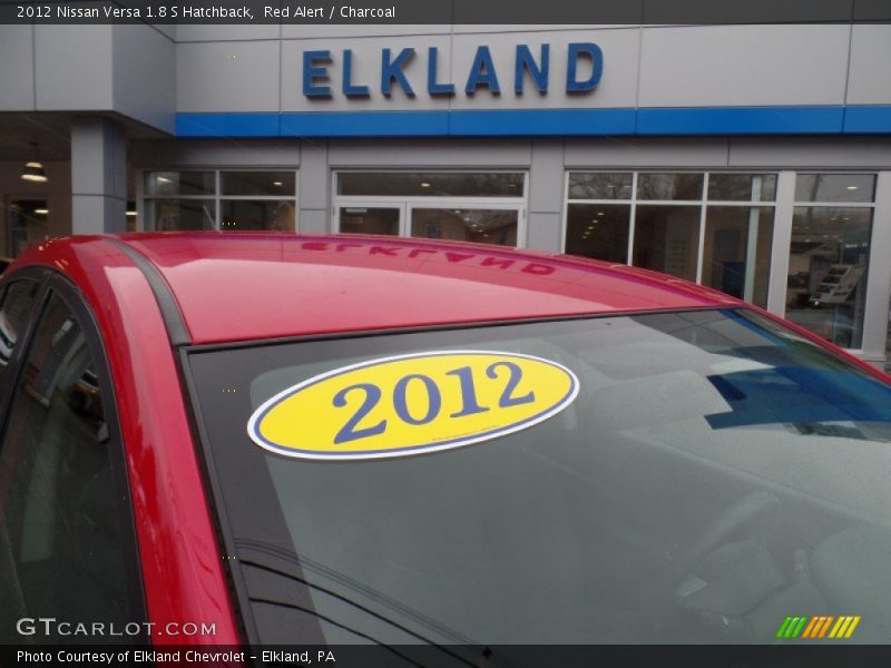 Red Alert / Charcoal 2012 Nissan Versa 1.8 S Hatchback