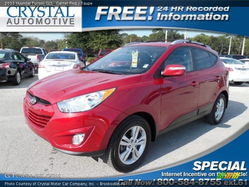 Garnet Red / Taupe 2013 Hyundai Tucson GLS