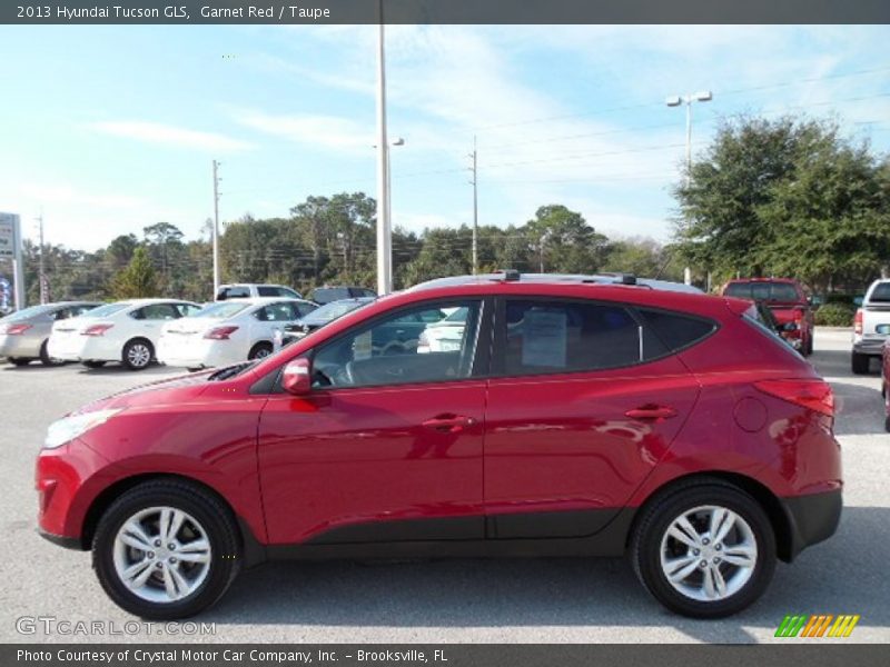 Garnet Red / Taupe 2013 Hyundai Tucson GLS