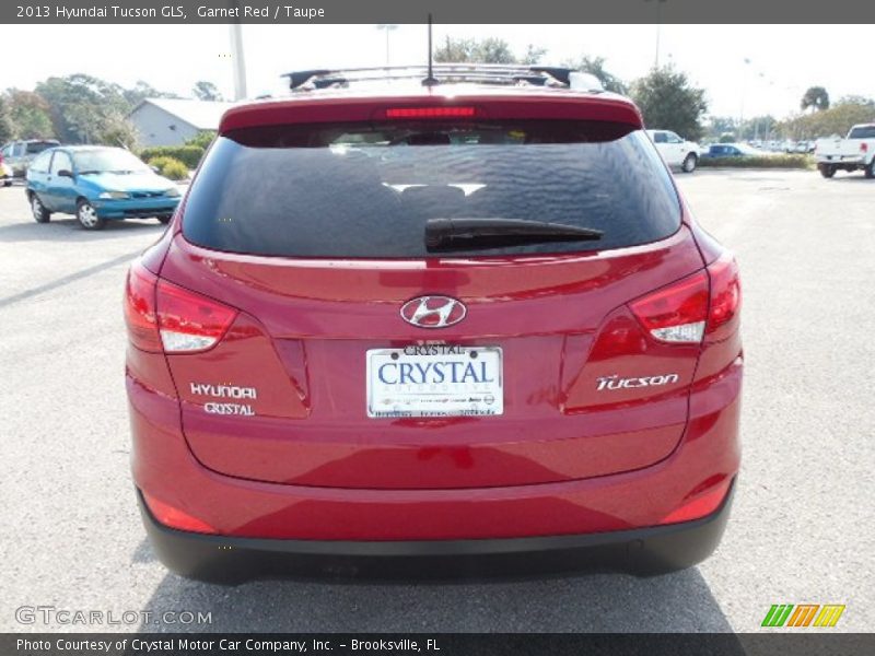 Garnet Red / Taupe 2013 Hyundai Tucson GLS