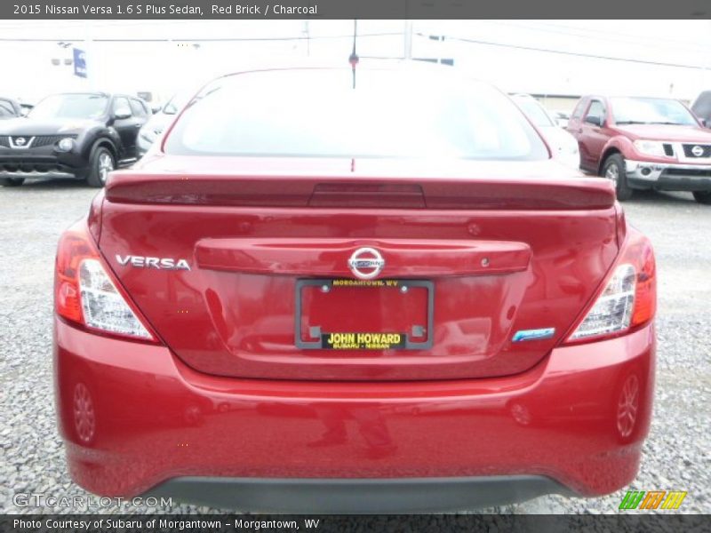 Red Brick / Charcoal 2015 Nissan Versa 1.6 S Plus Sedan