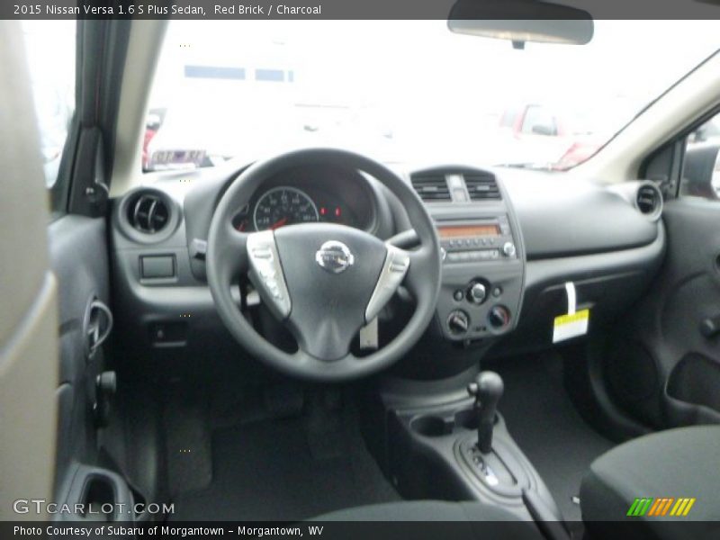 Red Brick / Charcoal 2015 Nissan Versa 1.6 S Plus Sedan