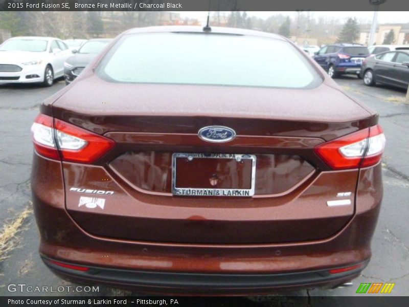 Bronze Fire Metallic / Charcoal Black 2015 Ford Fusion SE