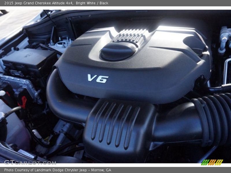 Bright White / Black 2015 Jeep Grand Cherokee Altitude 4x4