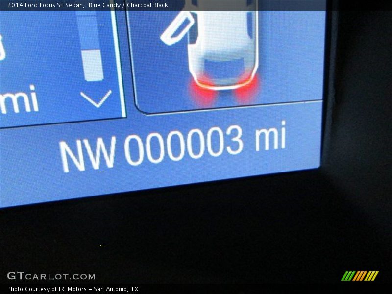 Blue Candy / Charcoal Black 2014 Ford Focus SE Sedan