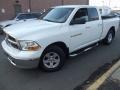 2011 Bright White Dodge Ram 1500 SLT Quad Cab 4x4  photo #1