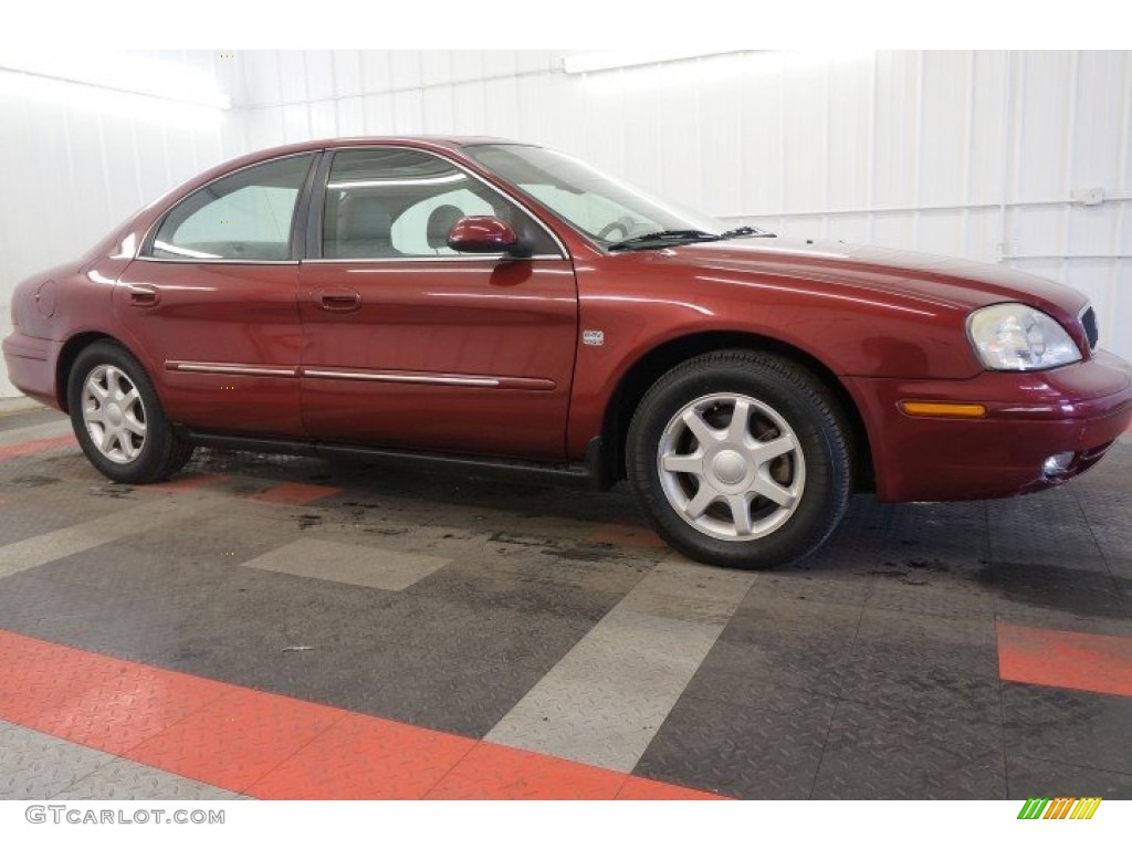 2003 Sable LS Premium Sedan - Matador Red Metallic / Medium Graphite photo #6