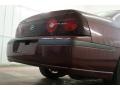 2000 Dark Carmine Red Metallic Chevrolet Impala LS  photo #51