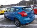 2014 Blue Candy Ford Focus SE Hatchback  photo #6