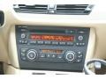 2013 BMW X1 Beige Interior Audio System Photo