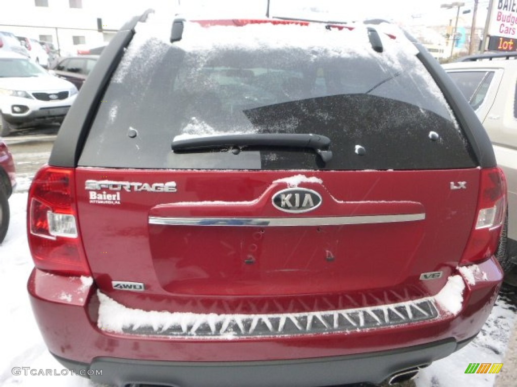 2009 Sportage LX V6 4x4 - Volcanic Red / Black photo #2