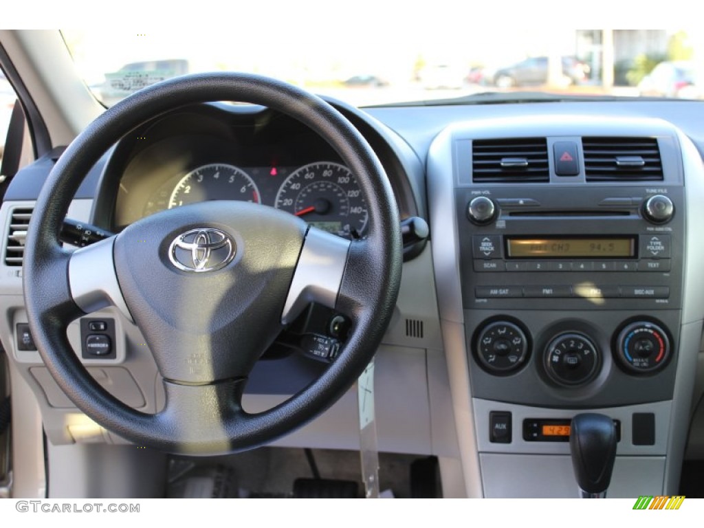 2011 Corolla LE - Sandy Beach Metallic / Ash photo #23