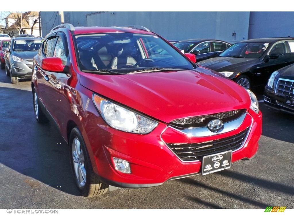 2011 Tucson GLS - Garnet Red / Taupe photo #1