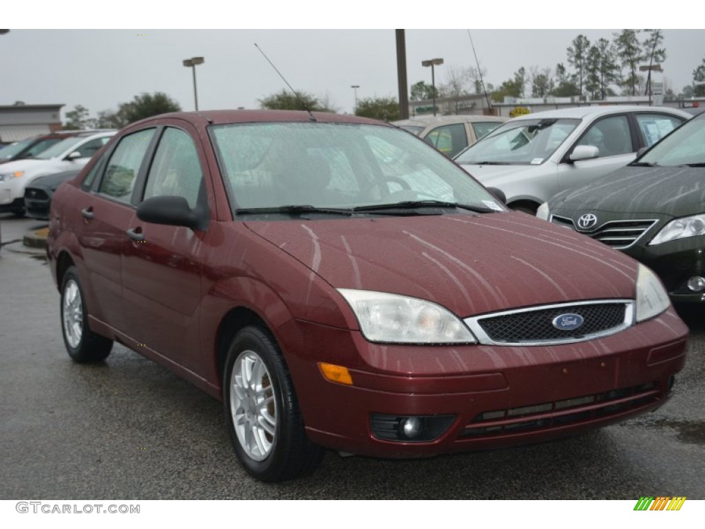 2007 Focus ZX4 SE Sedan - Dark Toreador Red Metallic / Dark Pebble/Light Pebble photo #1