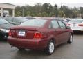 2007 Dark Toreador Red Metallic Ford Focus ZX4 SE Sedan  photo #3