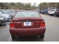 2007 Dark Toreador Red Metallic Ford Focus ZX4 SE Sedan  photo #4