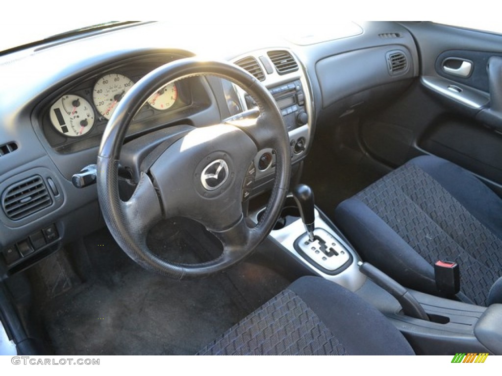 2003 Protege 5 Wagon - Sunlight Silver Metallic / Off Black photo #5