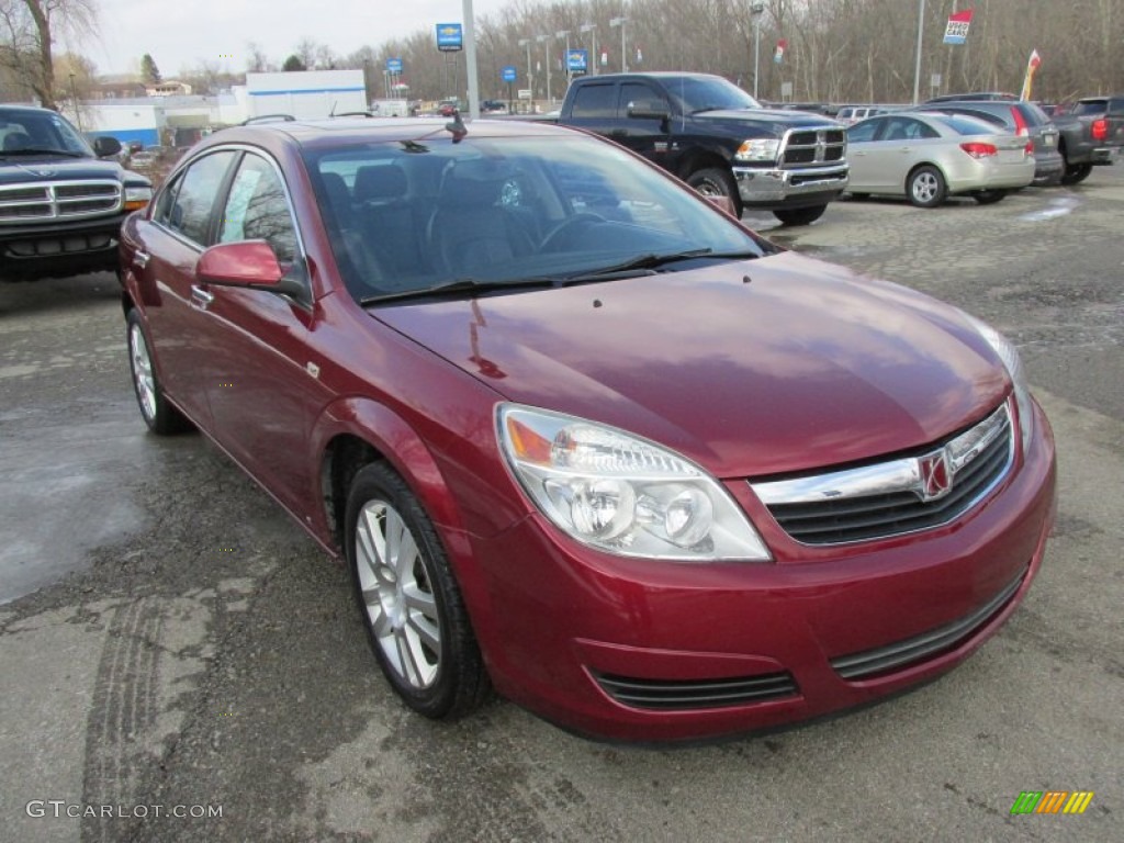 2009 Aura XR - Red Jewel Tintcoat / Black photo #10