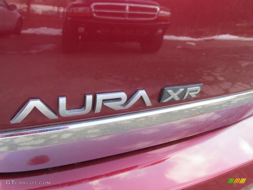 2009 Aura XR - Red Jewel Tintcoat / Black photo #16