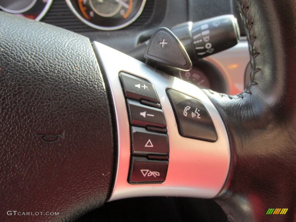 2009 Aura XR - Red Jewel Tintcoat / Black photo #32