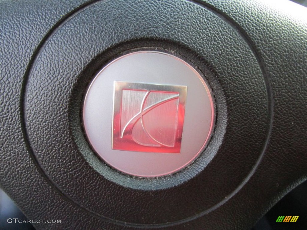 2009 Aura XR - Red Jewel Tintcoat / Black photo #38