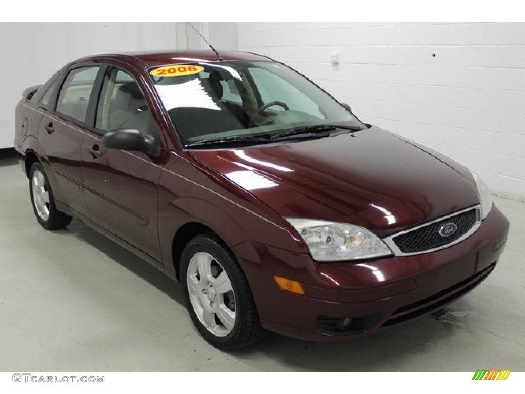 2006 Focus ZX4 SES Sedan - Dark Toreador Red Metallic / Charcoal/Light Flint photo #1