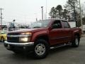 2005 Dark Cherry Red Metallic Chevrolet Colorado LS Crew Cab 4x4  photo #1