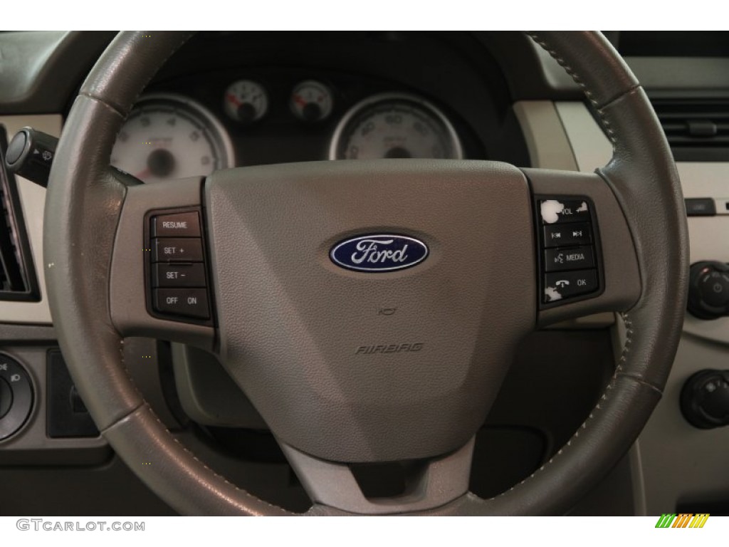 2008 Focus SE Sedan - Light Ice Blue Metallic / Medium Stone photo #6