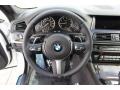Black 2015 BMW 5 Series 550i Sedan Steering Wheel