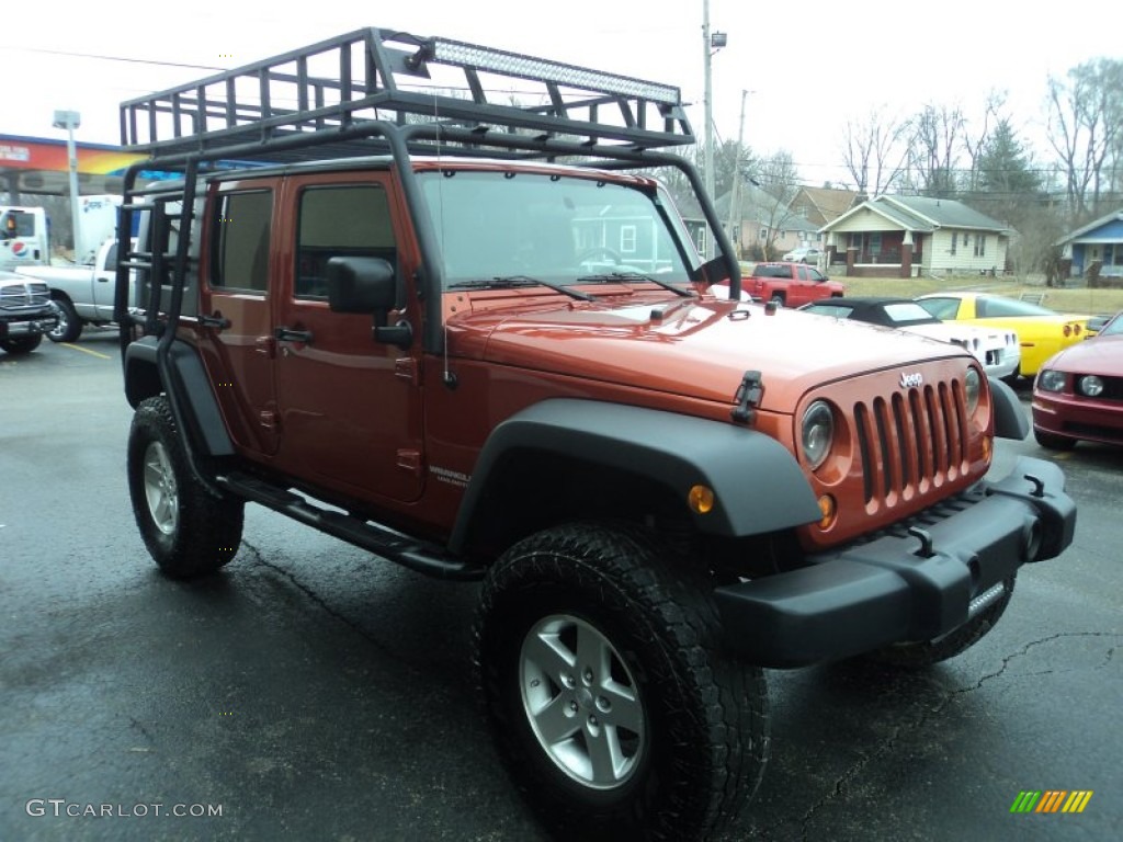 Sunburst Orange Pearl 2009 Jeep Wrangler Unlimited Rubicon 4x4 Exterior Photo #101094902