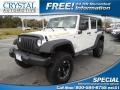Stone White 2010 Jeep Wrangler Unlimited Islander Edition 4x4