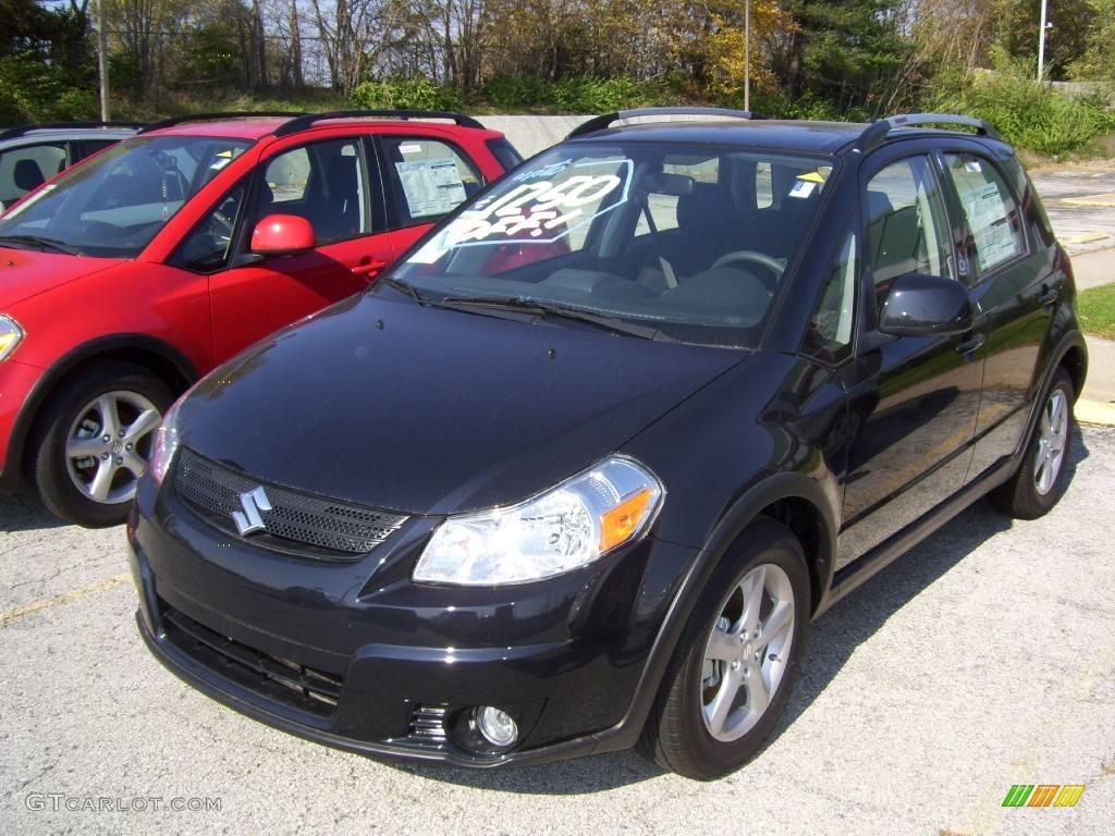 2009 SX4 Crossover Touring AWD - Black Pearl Metallic / Black photo #1