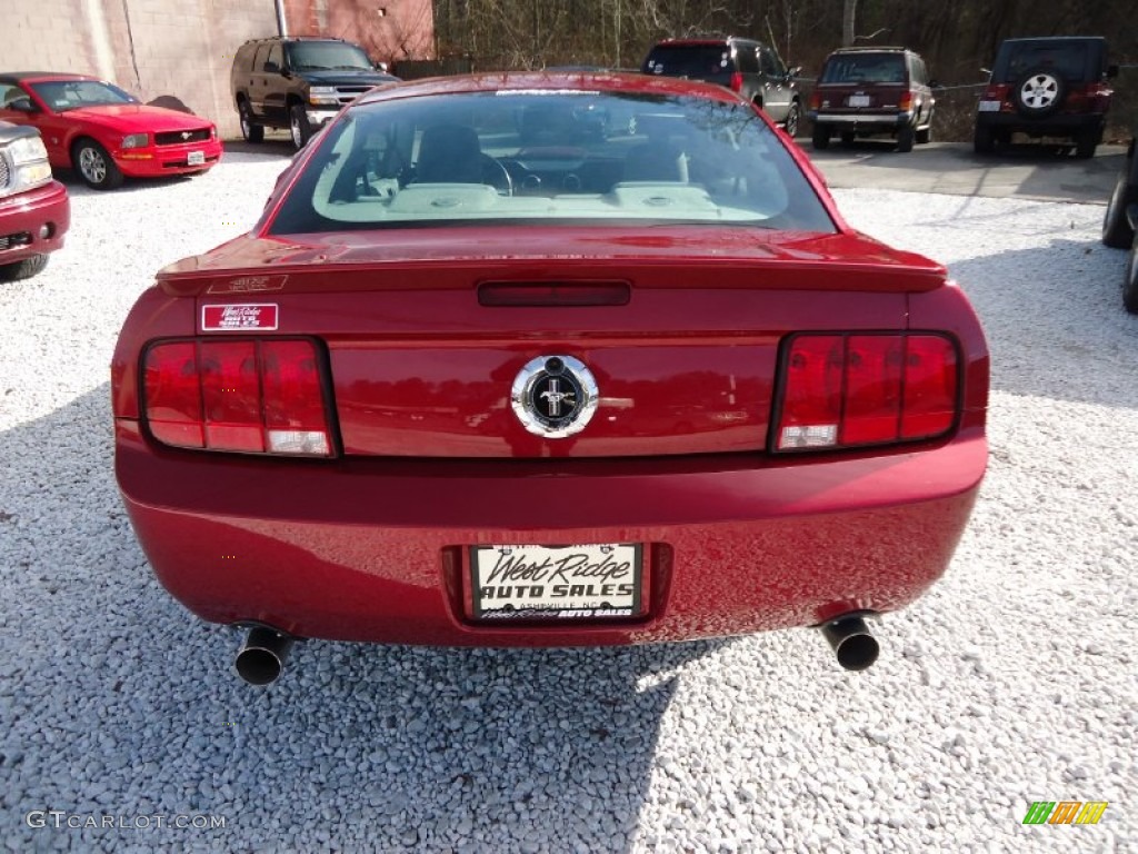 2007 Mustang V6 Deluxe Coupe - Redfire Metallic / Light Graphite photo #6