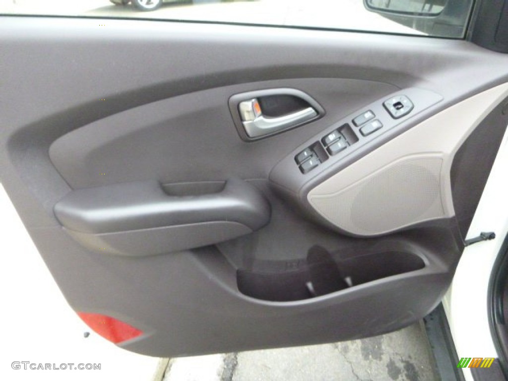 2010 Tucson GLS - Cotton White / Taupe photo #14
