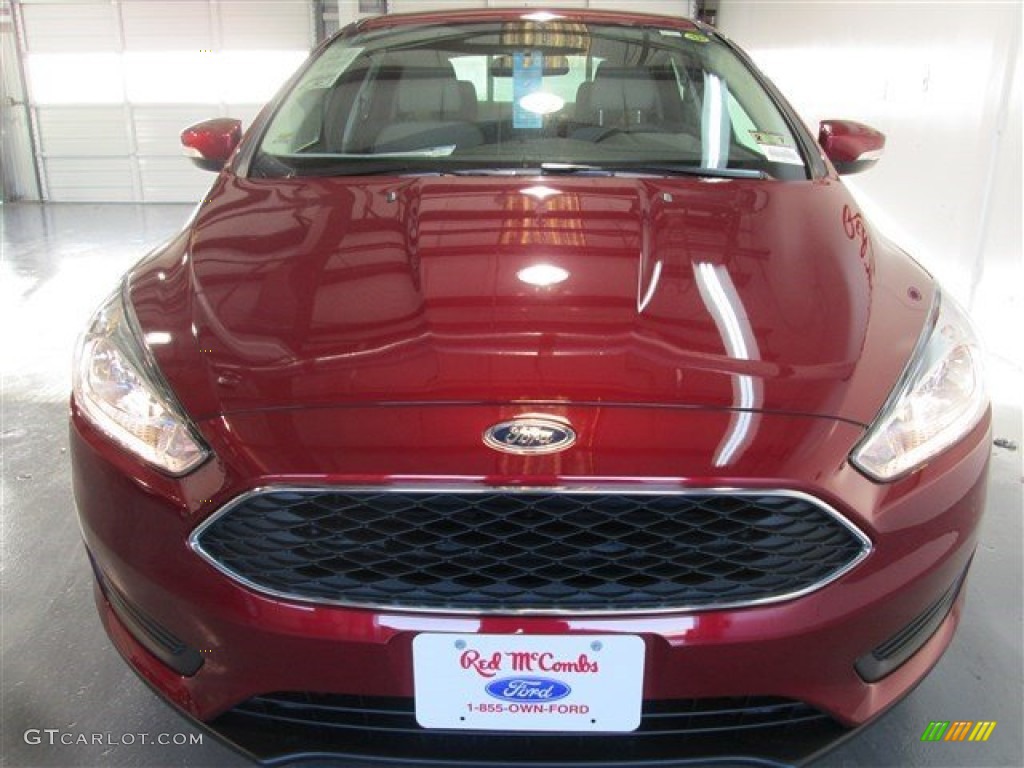 2015 Focus SE Sedan - Ruby Red Metallic / Medium Light Stone photo #2