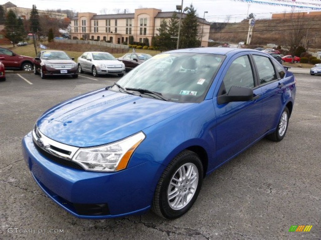 Blue Flame Metallic 2010 Ford Focus SE Sedan Exterior Photo #101479437