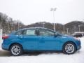 2015 Blue Candy Metallic Ford Focus SE Sedan  photo #1
