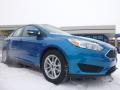 2015 Blue Candy Metallic Ford Focus SE Sedan  photo #6