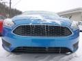 2015 Blue Candy Metallic Ford Focus SE Sedan  photo #7